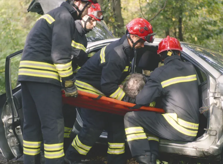 Emergency crews responding to a car crash
